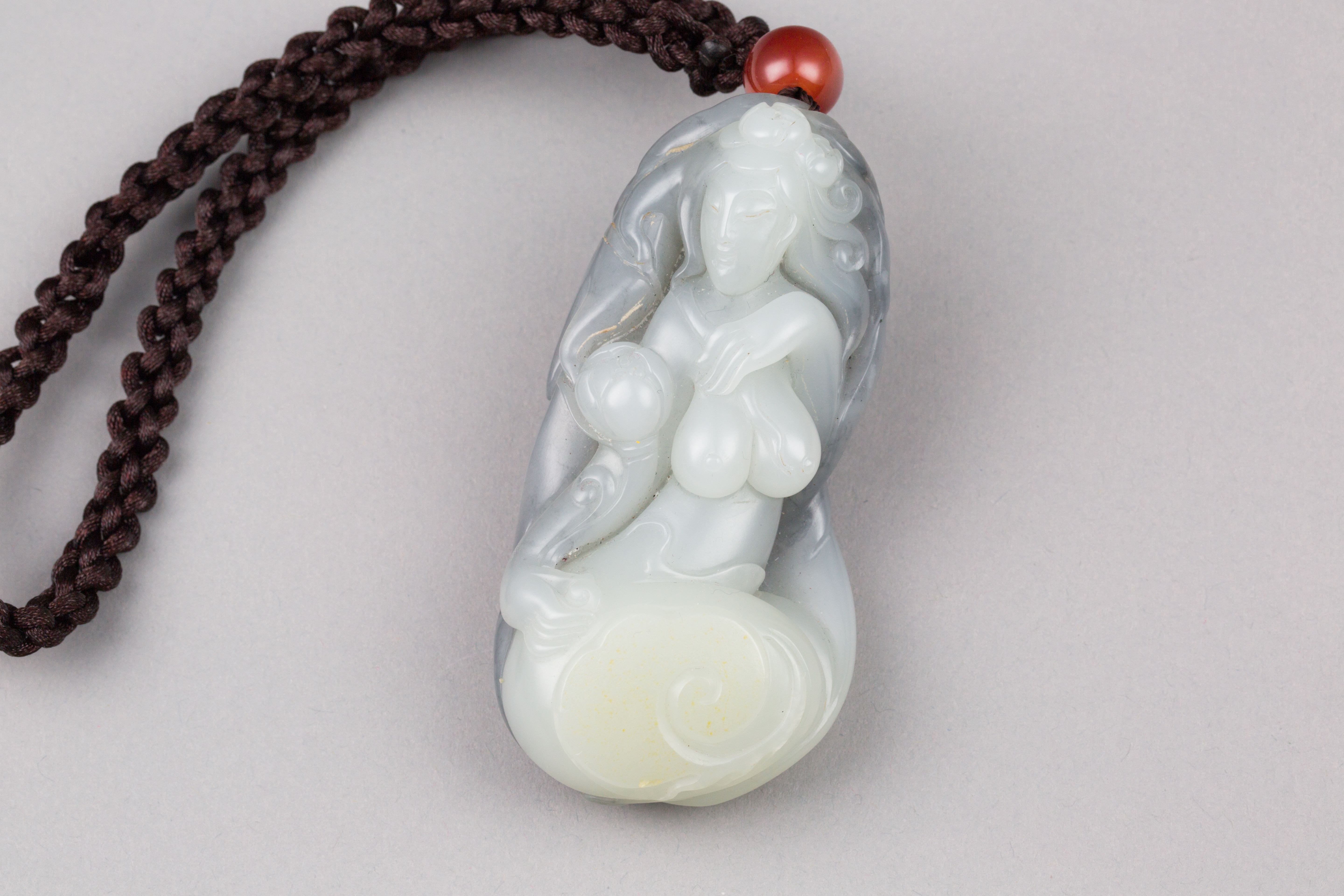 A Chinese XINJIANG HETIAN White and Black Jade Pendant