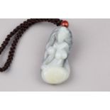 A Chinese XINJIANG HETIAN White and Black Jade Pendant