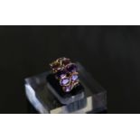 A 9CT Gilt Silver Purple Crystal Ring