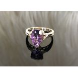 A 9CT Purple Crystal Ring