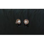 A 9ct gold and pearl ear studs