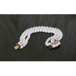 A Beautiful Akoya Pearl Bracelet with 14CT Gold Buckle
