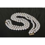 An Akoya Pearl Necklace with 18CT Gold Buckle