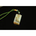 A CHINESE JADE PENDANT