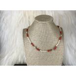 An Akoya Pearl and Natural Coral Necklace