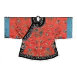 A LADY'S RED SILK INFORMAL JACKET, CHINA, LATE QING DYNASTY