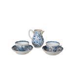 A PAIR OF BLUE AND WHITE PORCELAIN CUPS AND SAUCERS,