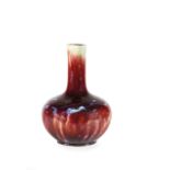 A LARGE RED FLAMBE' PORCELAIN BOTTLE VASE, CHINA, 19-20TH CENTURY