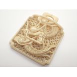 Antique hand carved ivory toggle with dr