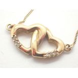 9ct gold diamond set twin heart pendant