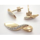9ct gold diamond set shoe pendant and ea