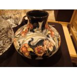 Moorcroft green vase with flowers H: 16