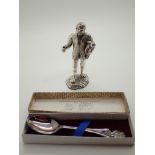 White metal figurine of a shepherd and a