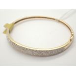 9ct gold hinged diamond bangle RRP £700.