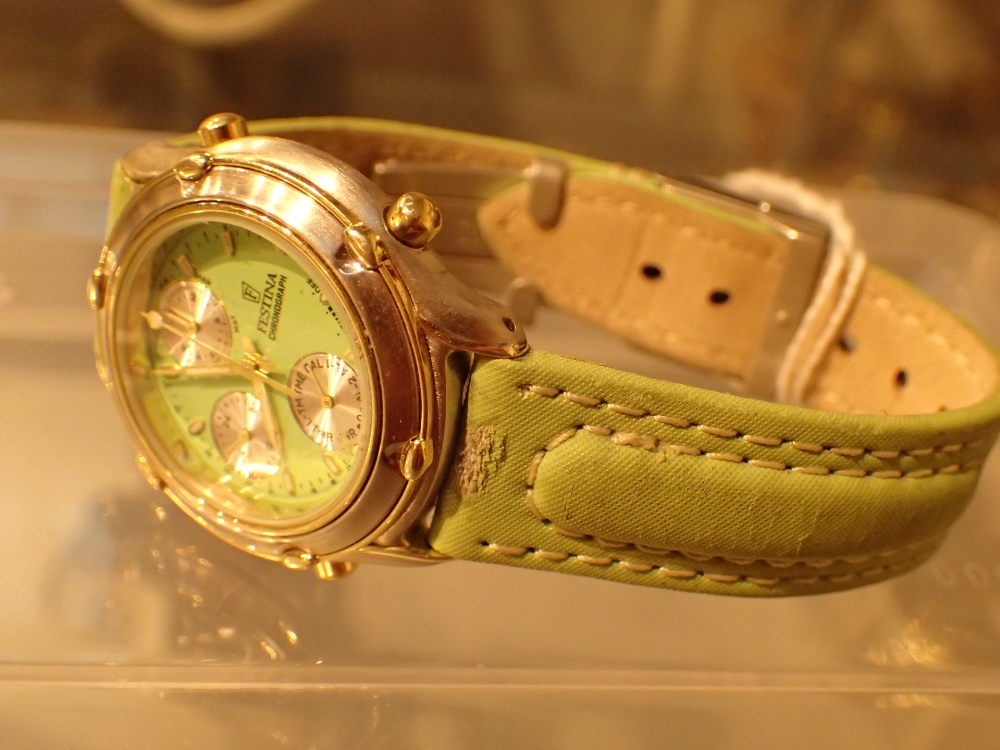 Festina chronograph ladies wristwatch on a green leather deployment strap