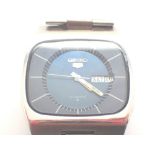 Vintage Seiko automatic wristwatch with blue face and stainless steel strap