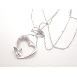 9ct white gold diamond set butterfly heart pendant on long 9ct white gold necklace