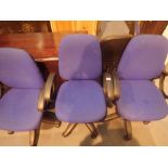 Five office swivel chairs