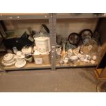 Two shelves of household ceramics and ornaments with quantity of electrical items camera telephones
