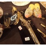 Collection of brassware and a pair of Eastern decorative slippers
