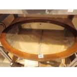 Large walnut framed oval wall mirror 85 x 60 cm