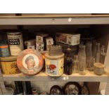 Quantity of vintage advertising tins and milk bottles etc