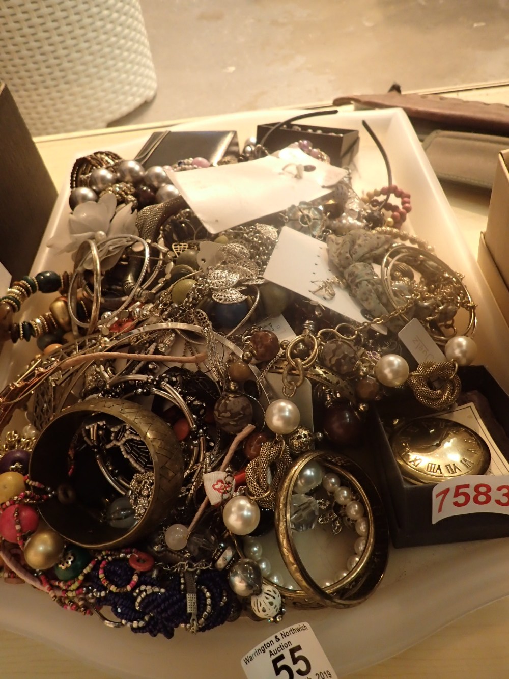 Tray of unsorted costume jewellery