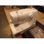 Toyota KP833 sewing machine with service receipt and instruction manual CONDITION REPORT: