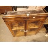 Antique wood bookshelf with twin glazed doors