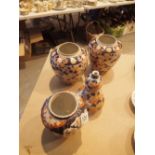 Four Oriental Imari style pots including double gourd vase