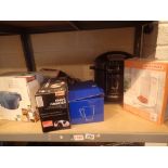 Shelf of kitchen appliances CONDITION REPORT: The electrical items included in this