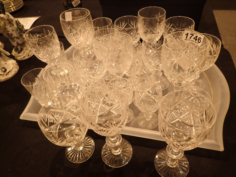 Group of cut crystal drinking glasses in