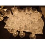 Group of cut crystal drinking glasses in