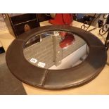 Circular leather framed mirror