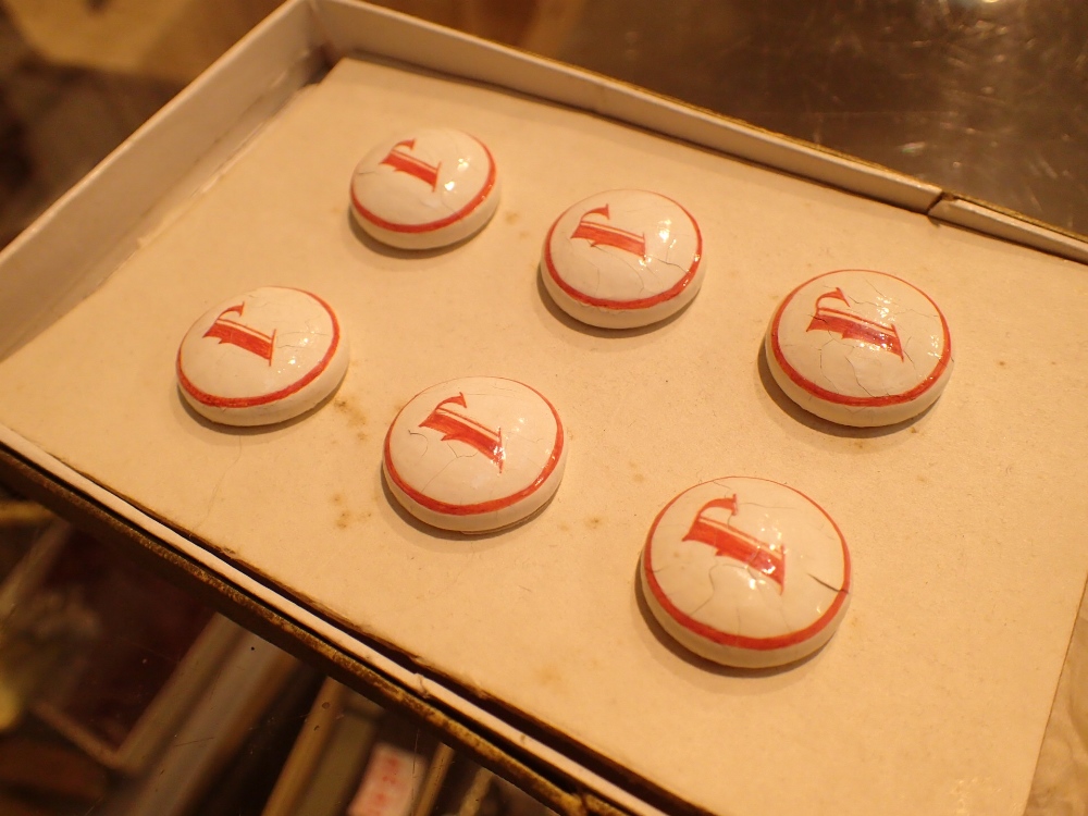 Six vintage ceramic buttons