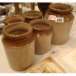 Five stoneware kitchen storage jars