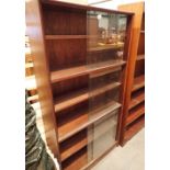 Large five shelf bookcase with sliding glass doors