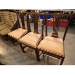Six mahogany dining chairs with upholstered seats