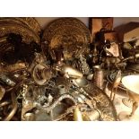 Large quantity of brassware wall plaques light sconces bowls bells figurines candle snuffer etc