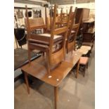 Teak extending dining table and four chairs possibly Jentique