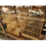 Two bird cages with a gold colour finish approximately 50 x 33 x 66 cm