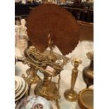 Brass table centre display stand pair of iron trivets candlestick holders and easle stands