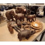 Collection of hand carved animals and figurines