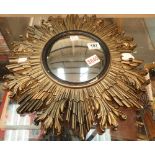 Damaged sunburst bullseye mirror