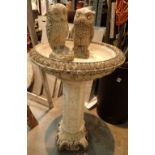 Reconstituted stone bird bath with two owl garden ornaments