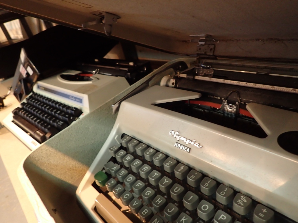 Two vintage typewriters Olympic Monica and Brother Electric 3600
