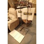 Pair of chrome plated retail clothing stands