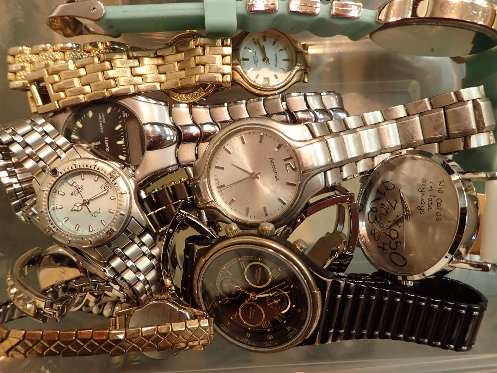 Box of mixed wristwatches including fashion examples