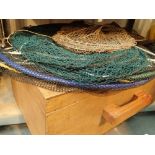 Large quantity of bagged bird feathers suitable for fly fish tying along with several keep nets