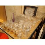 Shelf of glassware sets of wine glasses tumblers shot glasses seven decanter tops etc